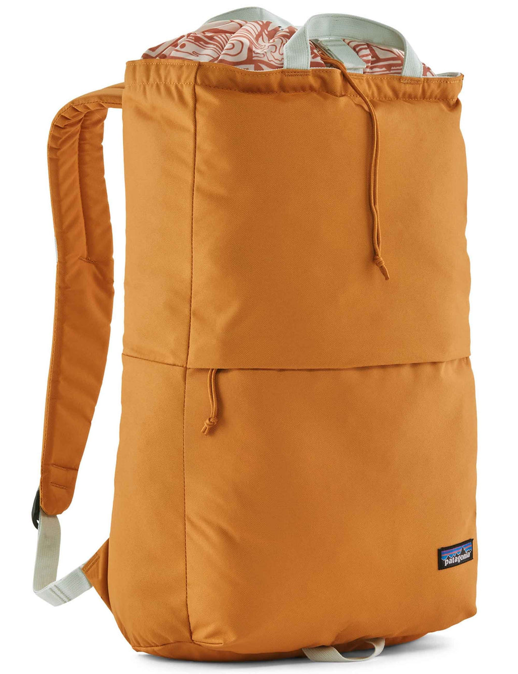 25L linked backpack in golden caramel with front pocket and drawstring top