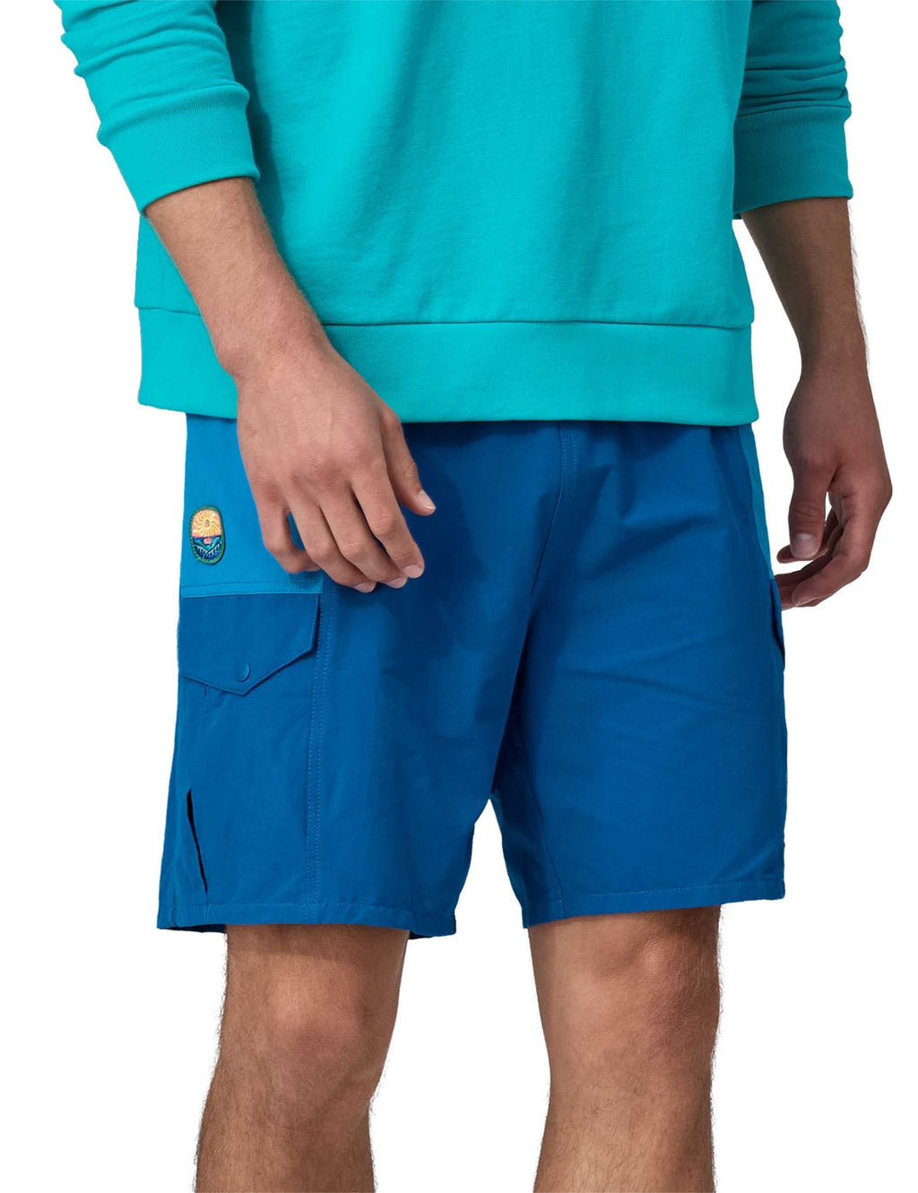 Blue cargo shorts with side cargo pocket and logo patch, elastic waist