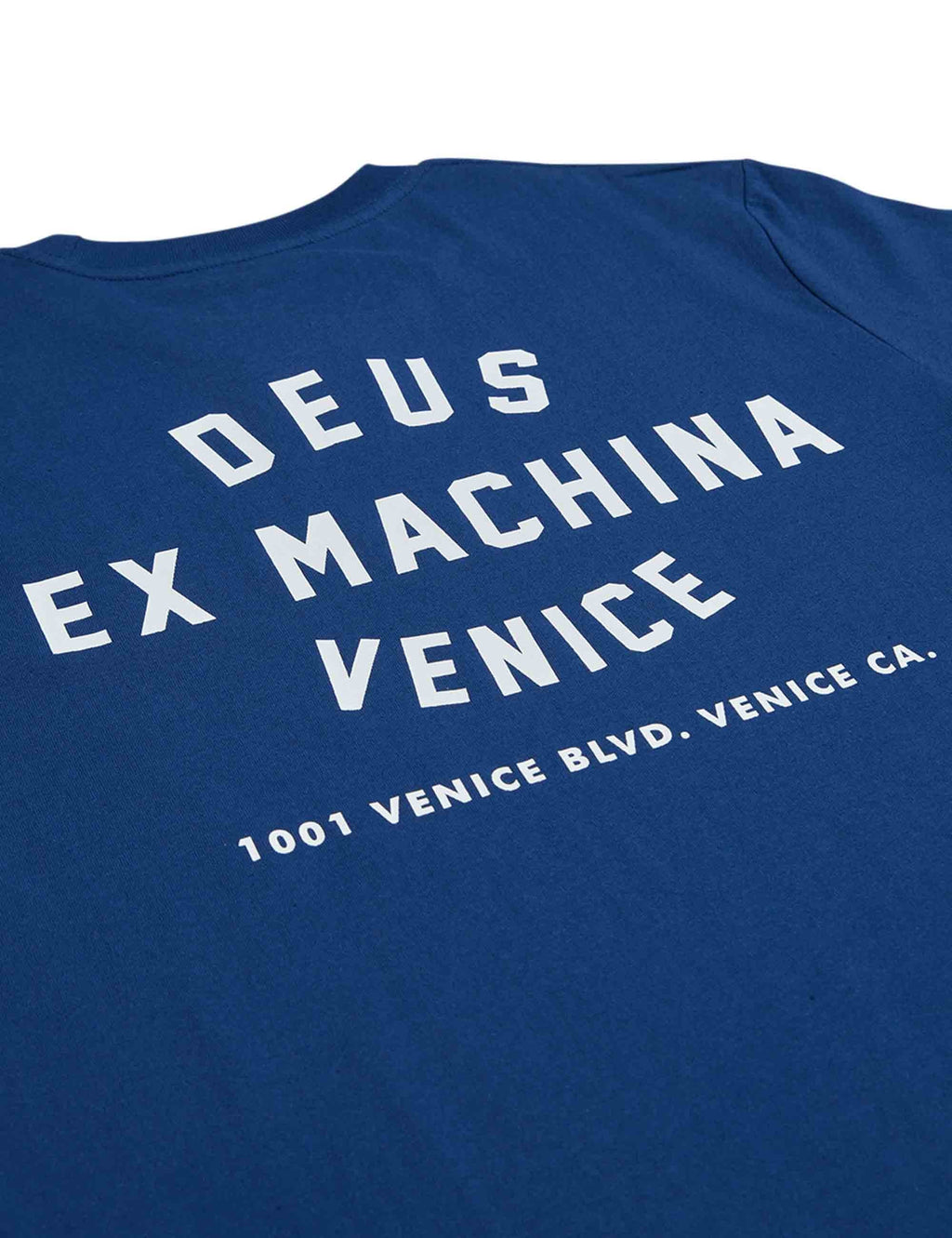 Blue crewneck T-shirt with 'DEUS EX MACHINA VENICE' text on the back