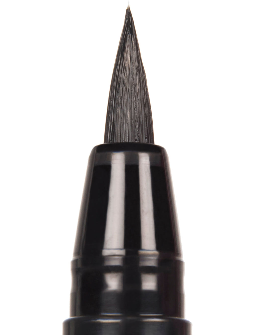 Black brush tip close-up on paint pen barrel