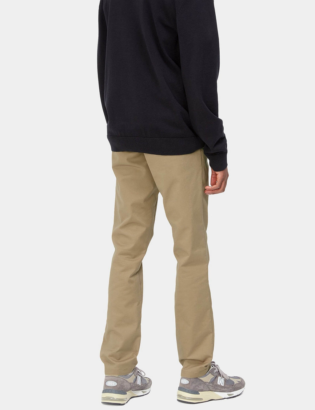 Beige leather Sid pant on model with angled front pockets and straight leg