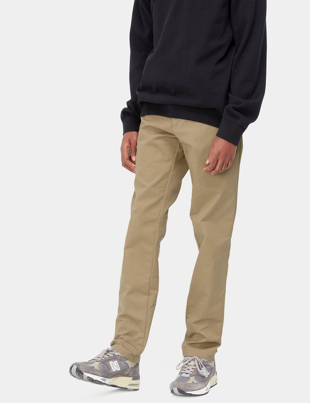 Beige leather Sid pant on model, relaxed fit with visible side seam