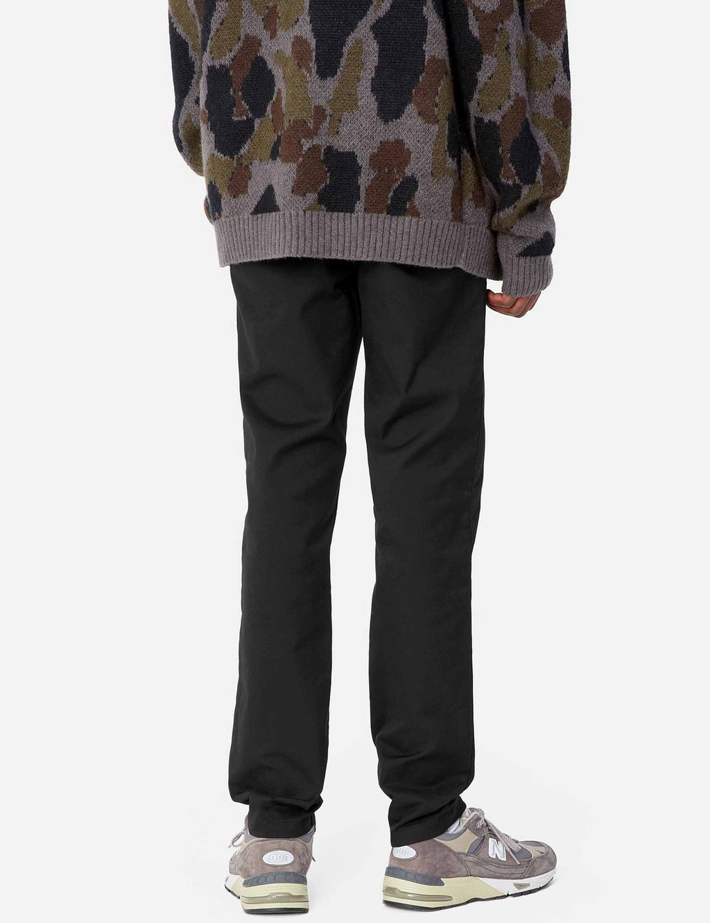 Black trousers with straight legs and ankle-length hem