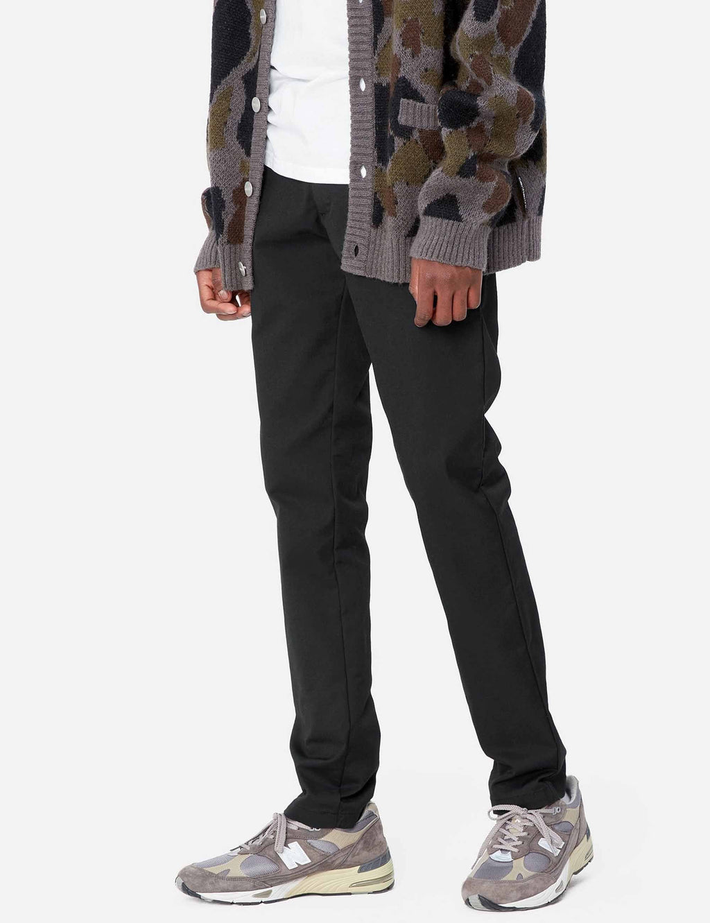 Black trousers with straight fit, side pockets, and belt loops at waistband