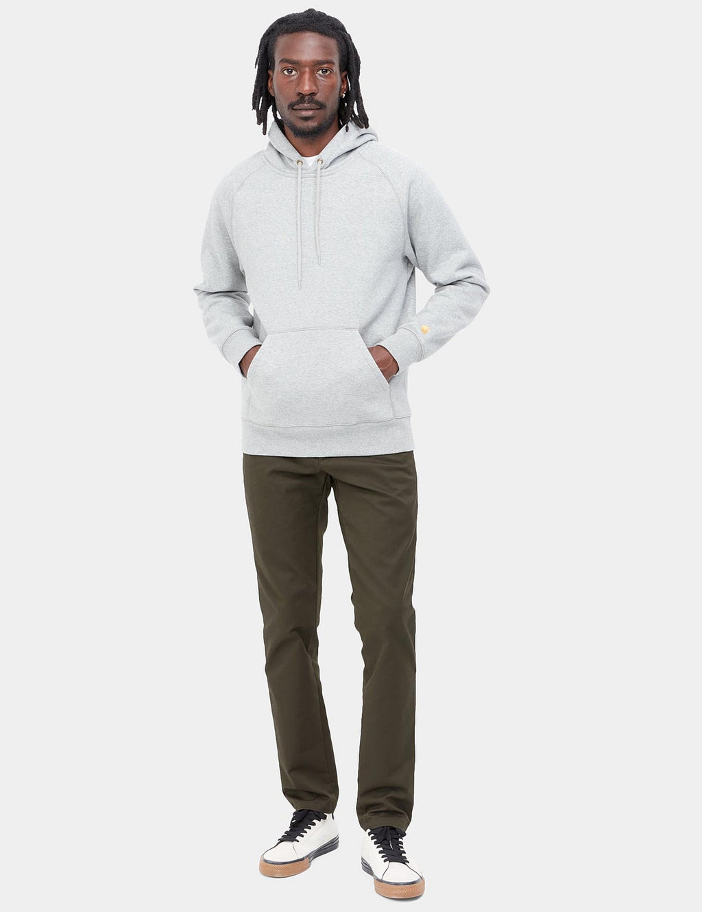 Olive-green straight-leg pants on model, front view.