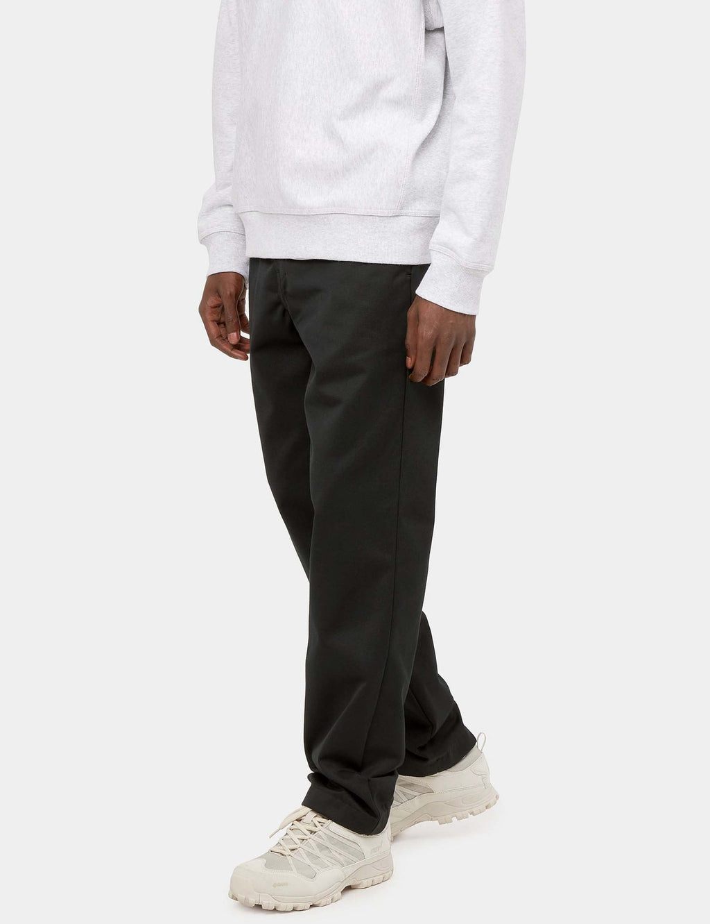 Black trousers with elastic waistband, tapered leg, and side pockets