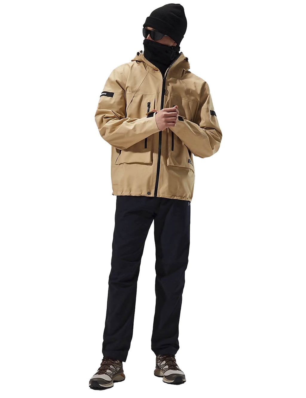 Gosforth jacket sand beige with black trim, adjustable hood, and front zip; logo sleeve patch