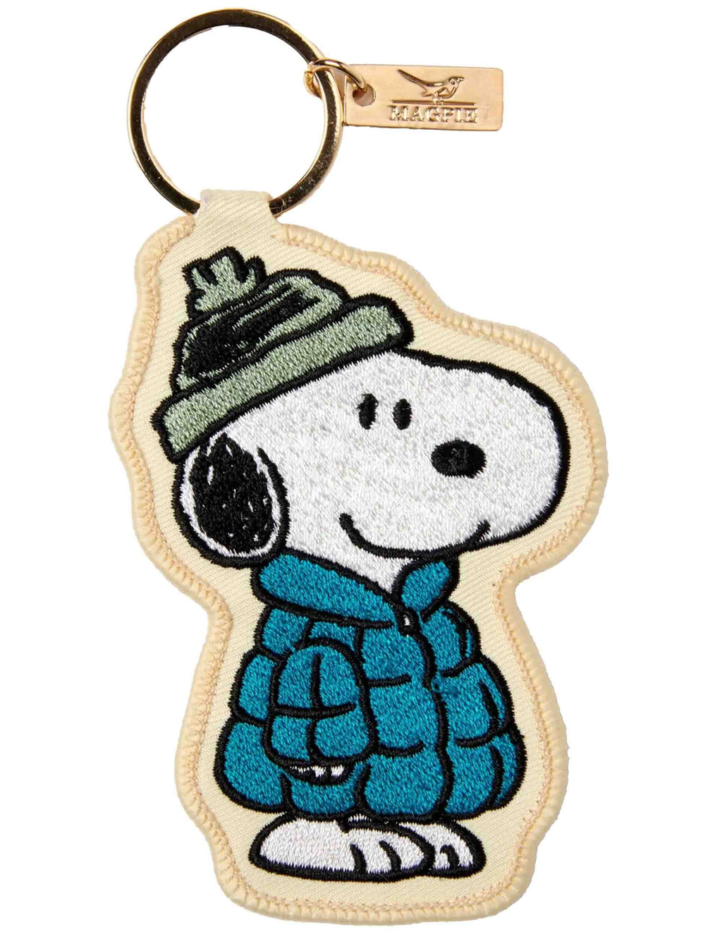Embroidered Snoopy key charm with blue puff jacket and green cap, attached to gold ring