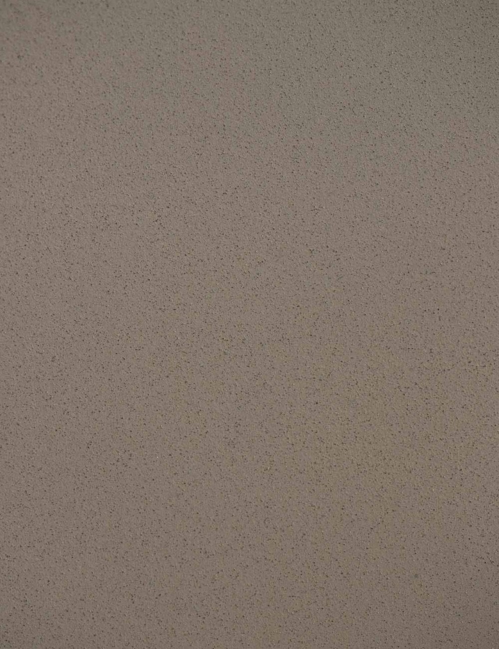 Concrete effect surface texture, mottled grey speckle finish.
