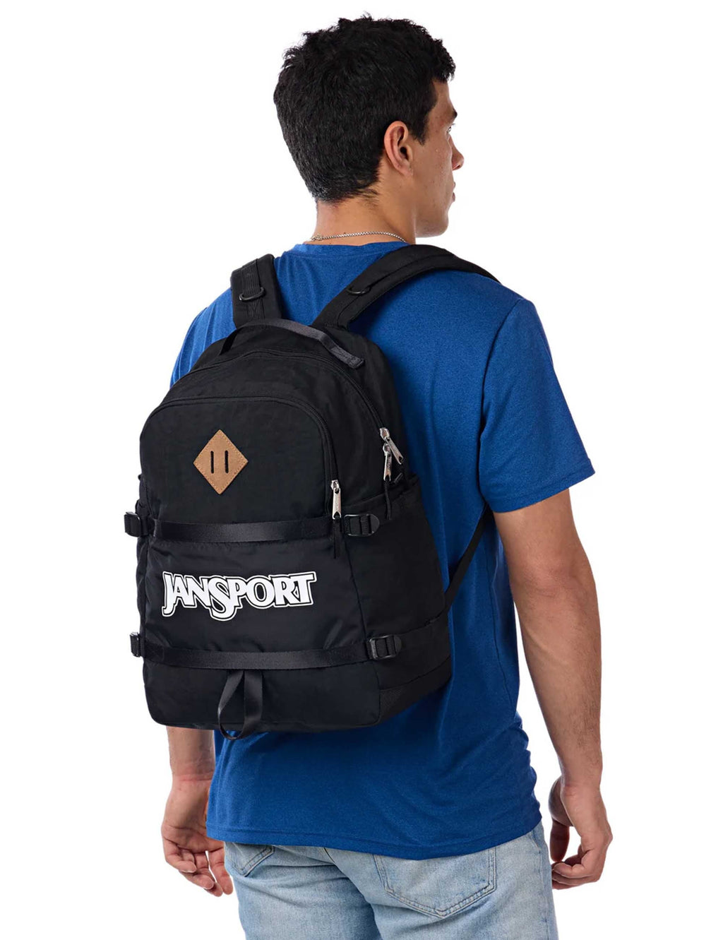 Black Jansport backpack worn on back with dual shoulder straps and side buckles
