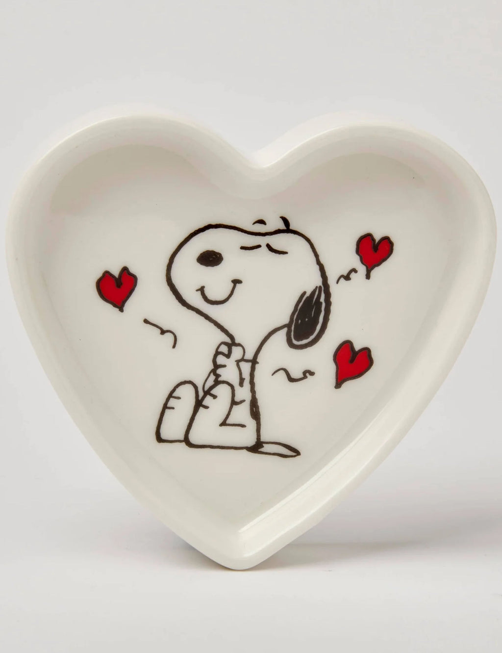 White heart-shaped Snoopy trinket dish with Snoopy and red hearts