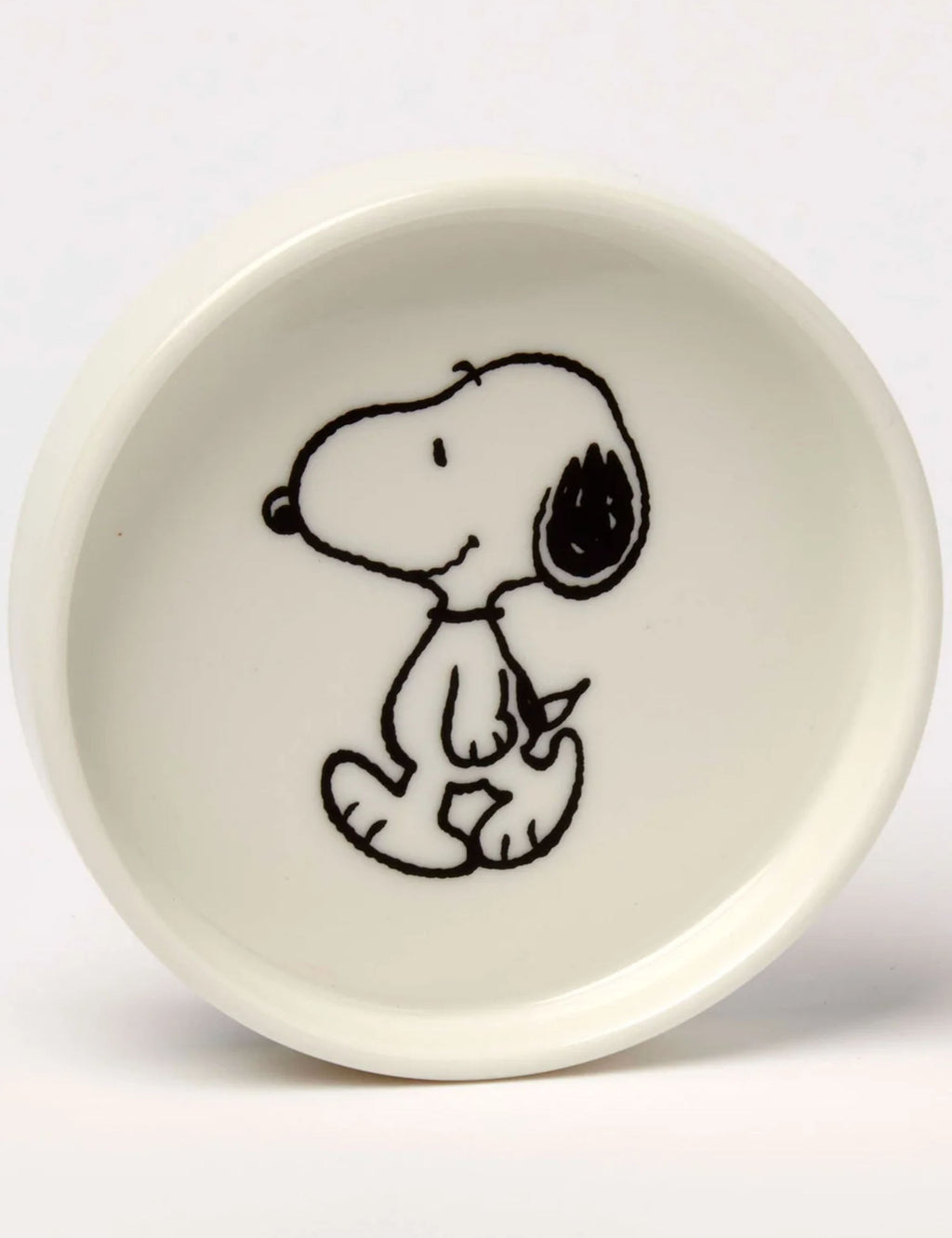 Round Snoopy trinket dish with Snoopy holding a dog leash, white ceramic