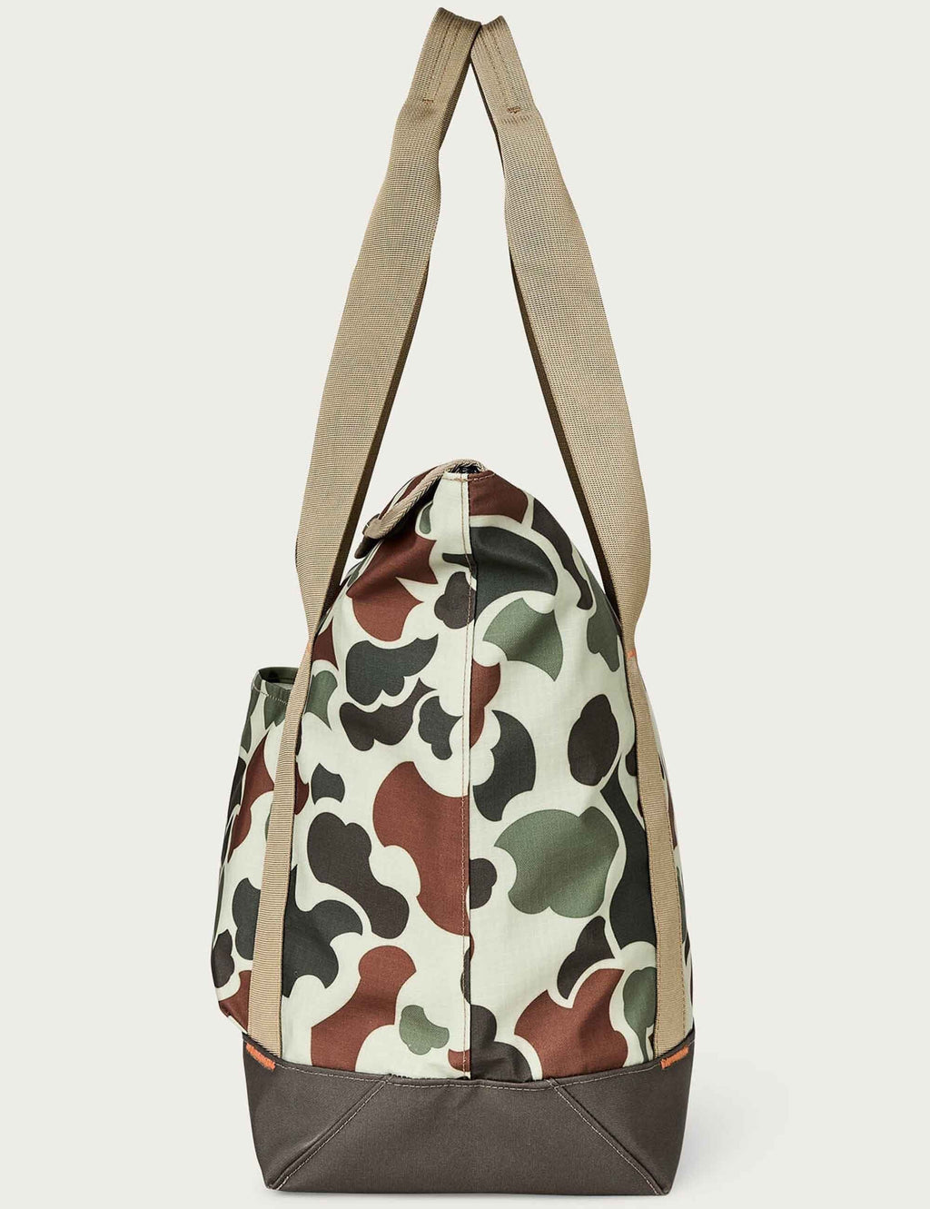 All-weather tote bag in shrub camo with side zipper and flat bottom.