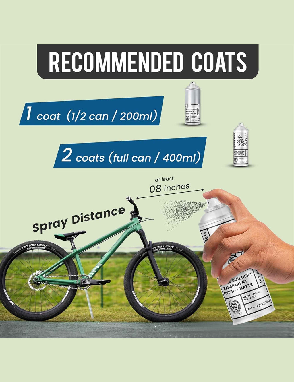 Hand holding transparent finish spray can dispensing over bike; Frame Builder's