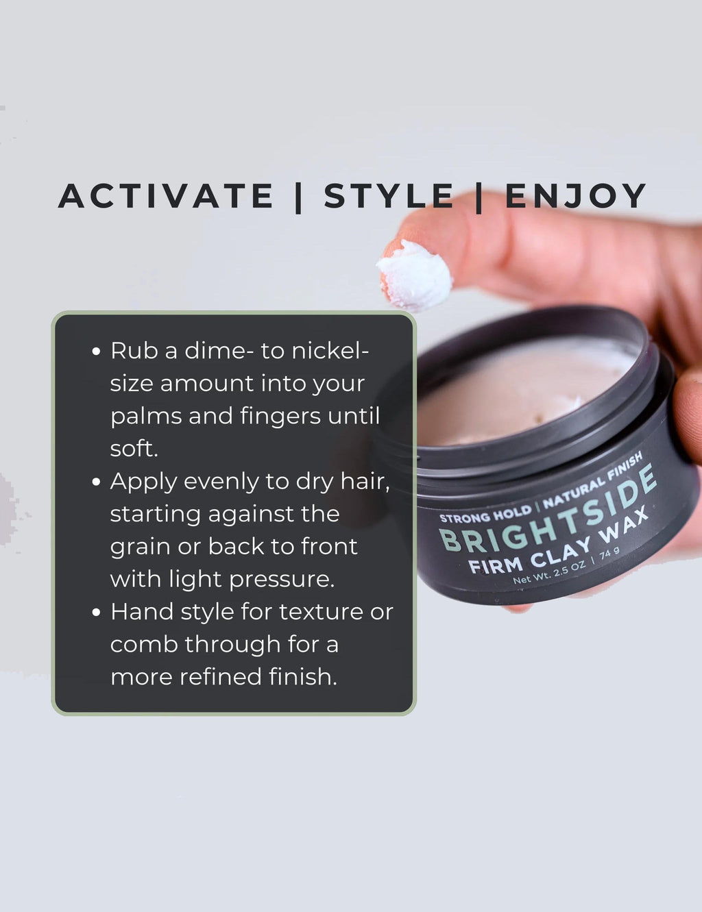 Hand applying firm clay wax from a jar for natural hold styling