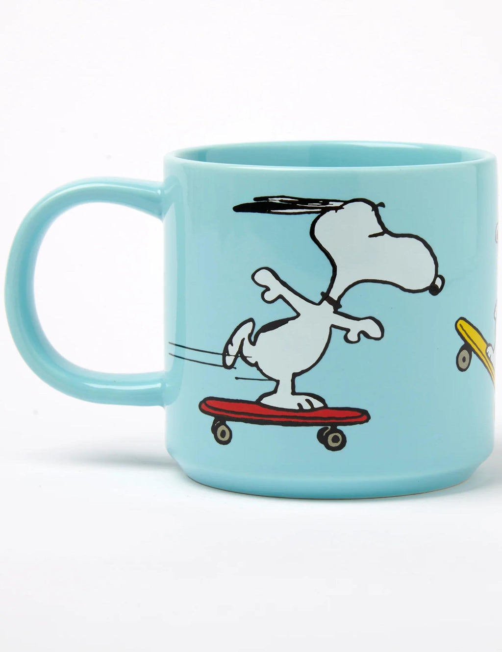 Turquoise Snoopy skateboard mug with side view of Snoopy on red skateboard
