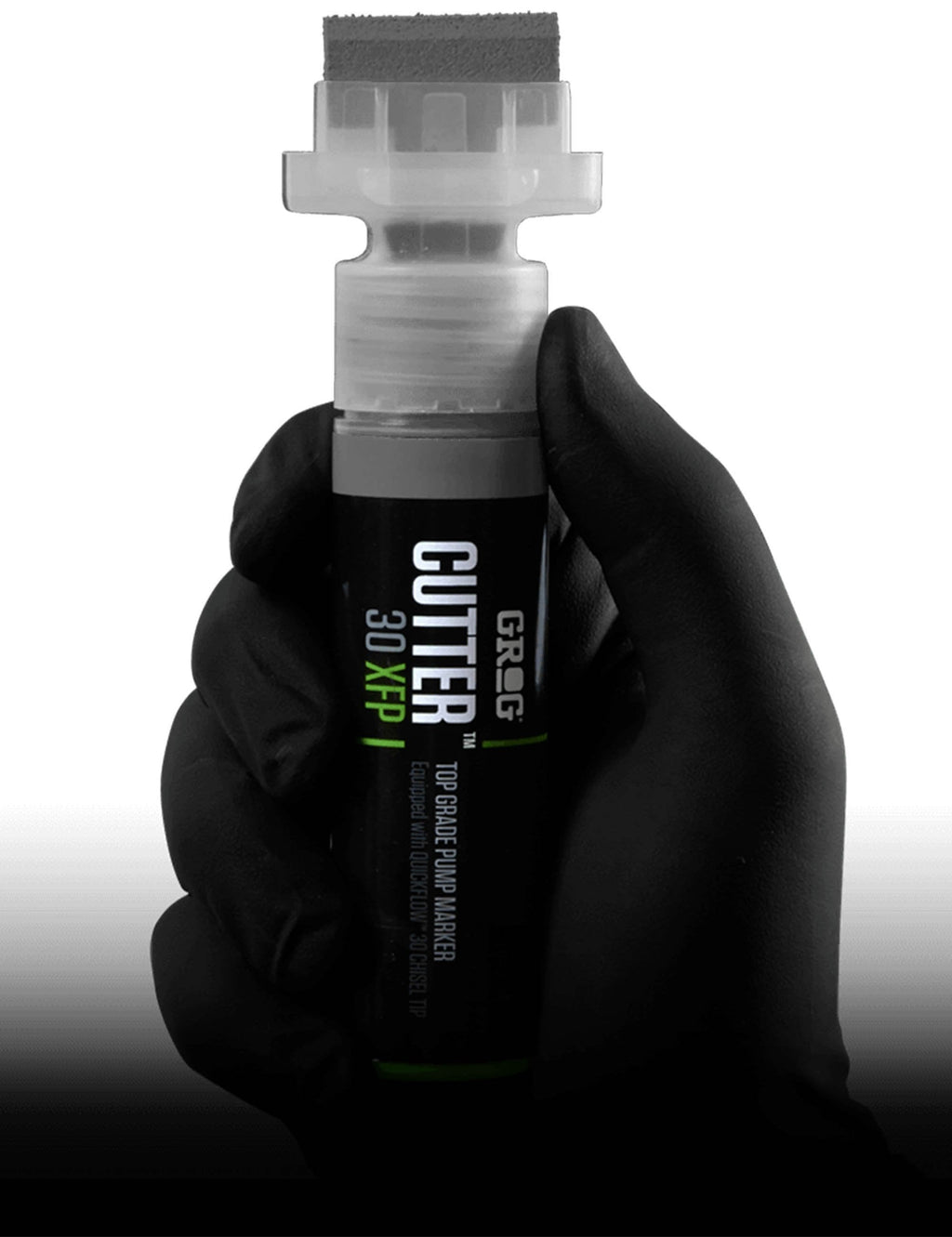 30mm XFP paint pen with green ink held in a black glove
