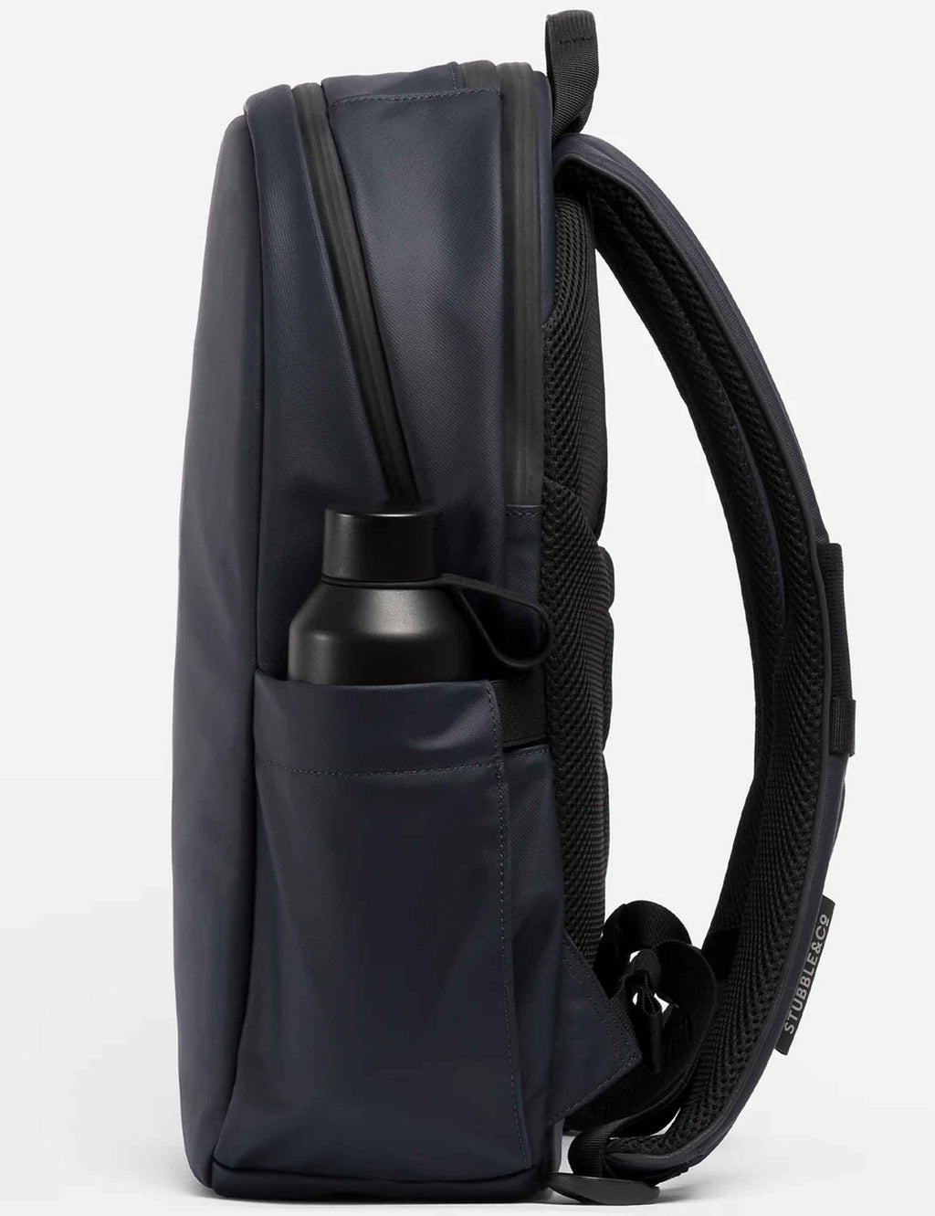Midnight blue backpack with side handle, front zip pocket, and shoulder strap