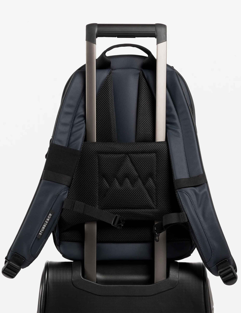 Midnight blue backpack with luggage handle pass-through and mesh back panel