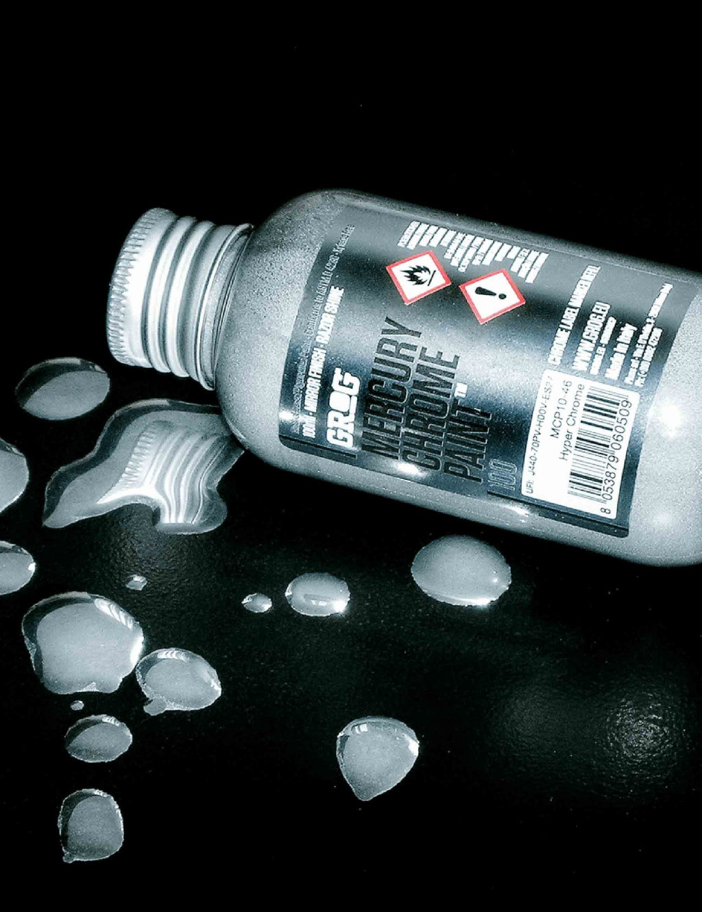Chrome paint refill bottle with metallic paint drops