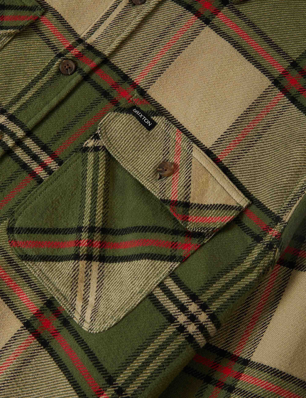 Plaid flannel shirt with angled chest pocket, green check with red and cream