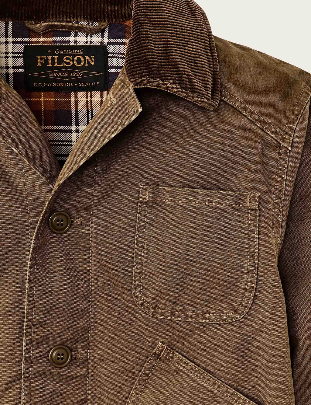 Canvas Outfitters jacket close-up of plaid inner collar and chest pocket with buttons