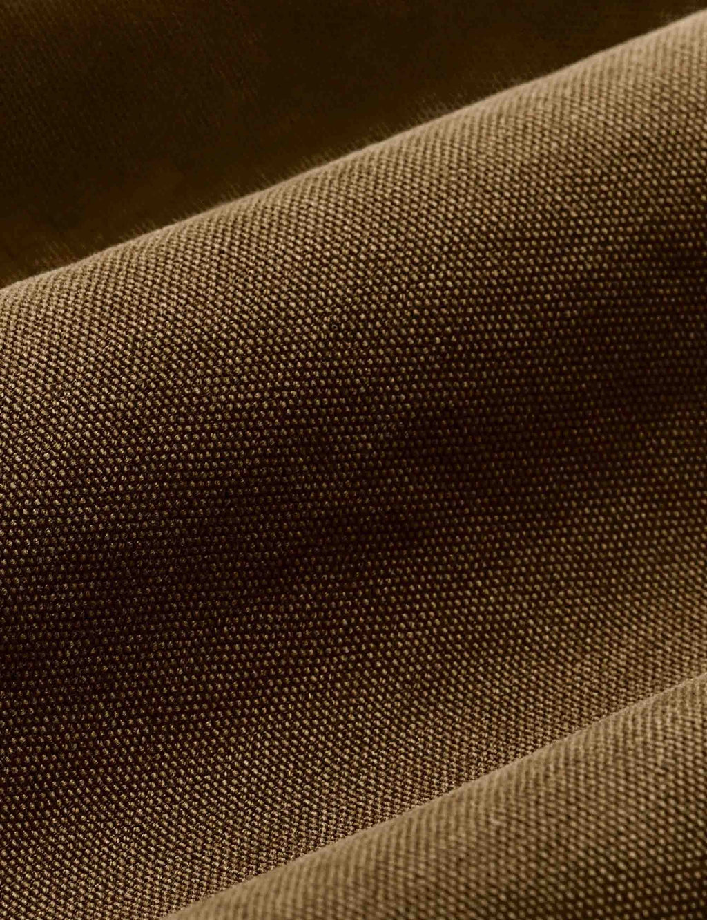 Canvas Outfitters jacket fabric close-up in dark brown textured weave