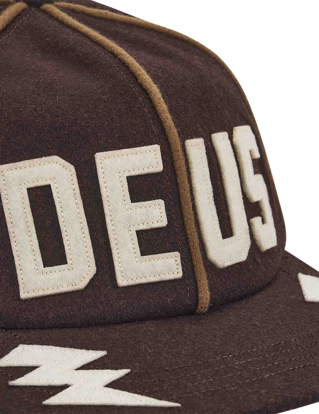 Dark brown cap with curved brim, close-up front 'DE' patch and lightning zigzag