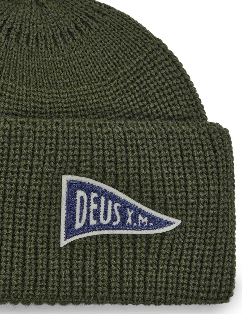 Beanie hat close-up in dark green with Deus X.M. logo patch