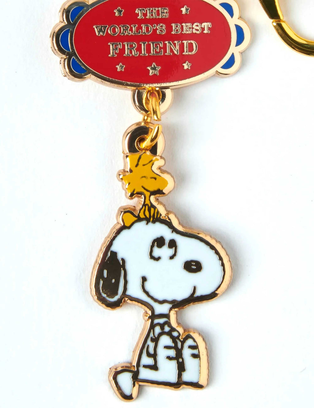 Snoopy keychain charm with oval 'World's Best Friend' tag and Snoopy standing figure