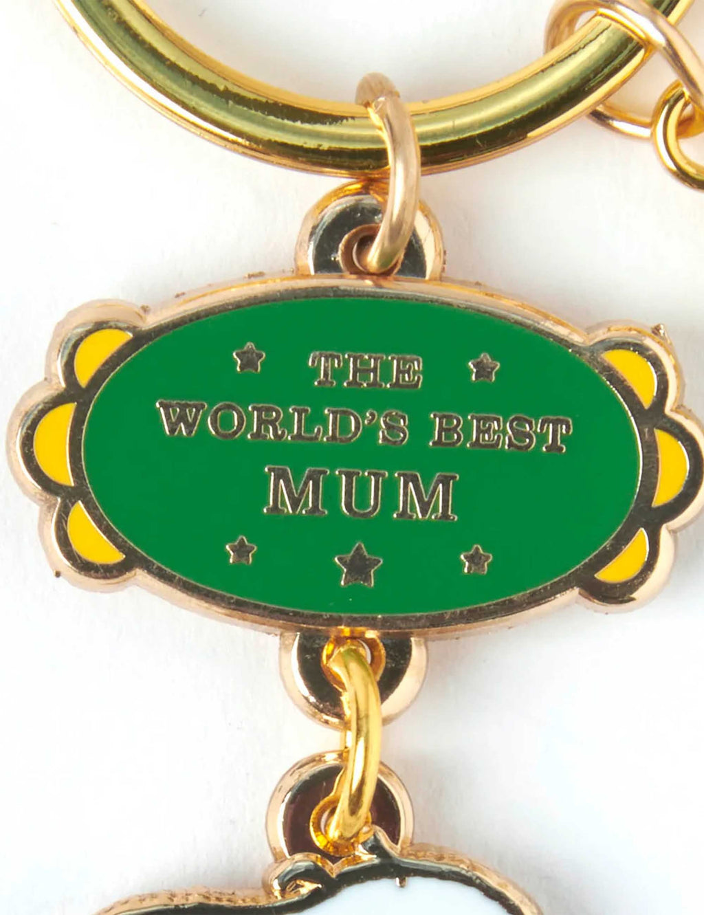 Snoopy World's Best Keychain - Mum by Magpie — close-up of green The World's Best Mum oval charm with gold ring and clasp