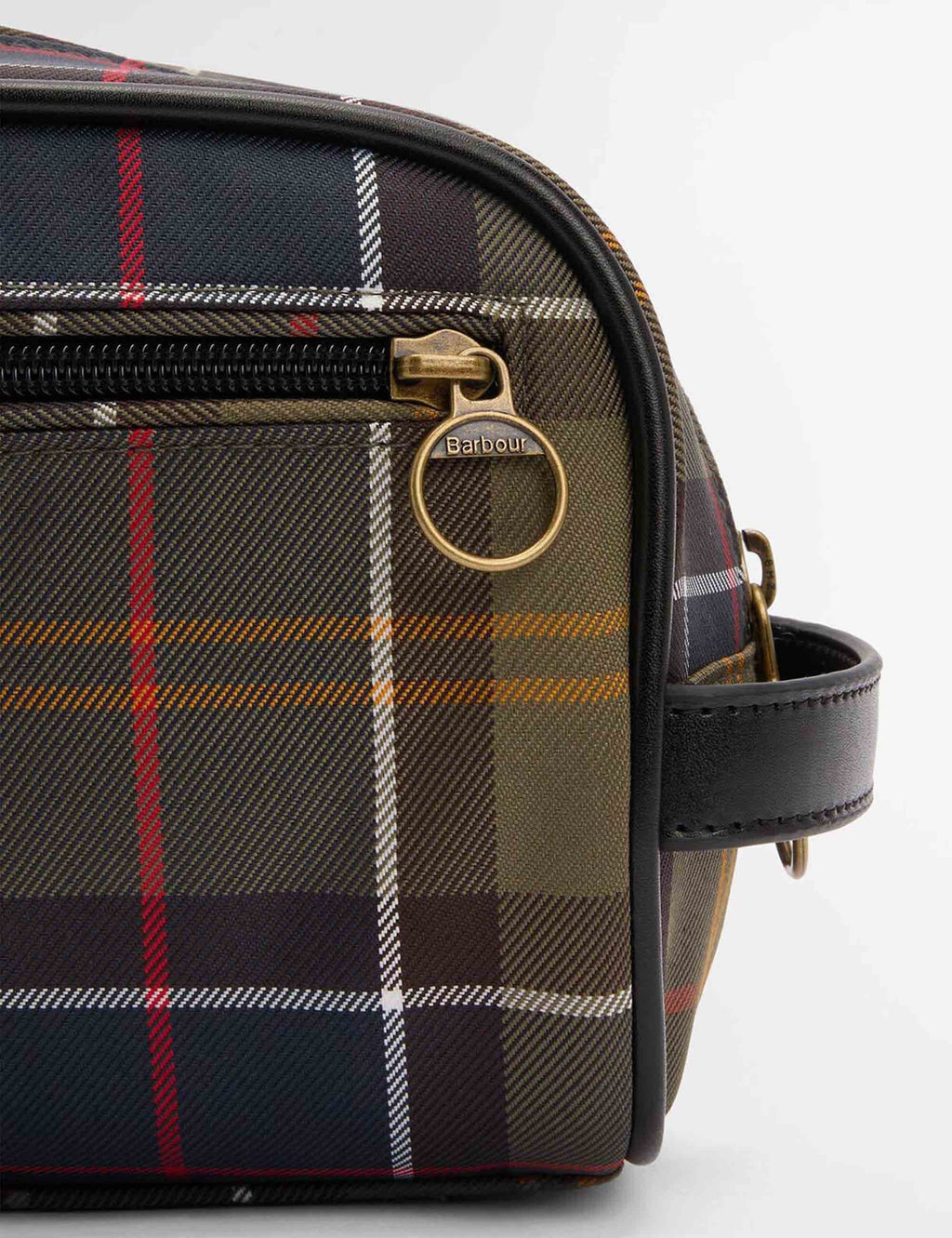 Tartan washbag side view with gold-tone ring pull on zip and dark leather-look strap