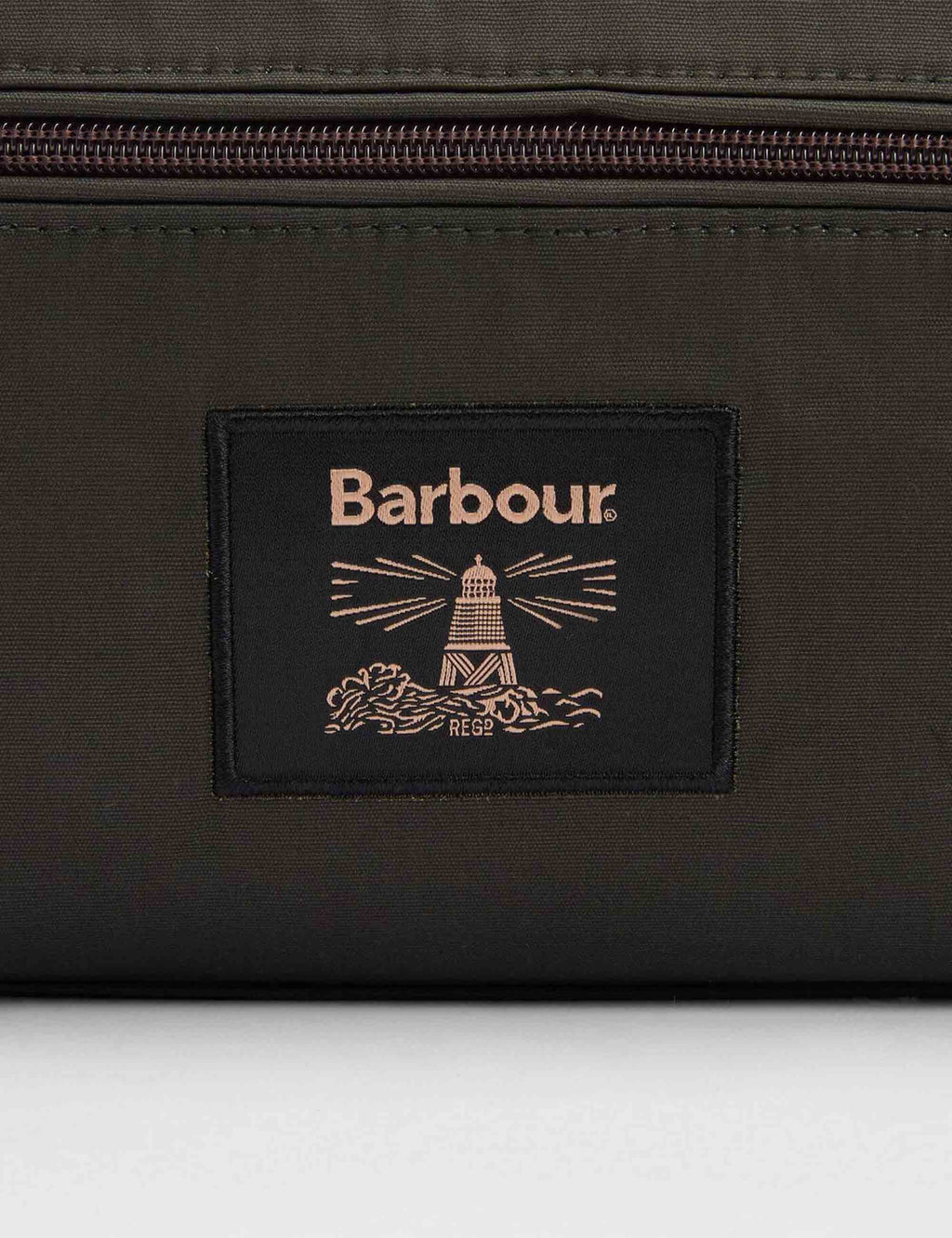 Wax wash bag front patch with Barbour logo and maroon zipper