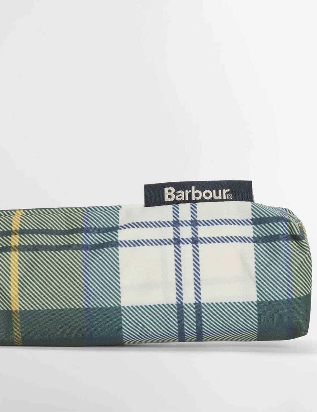 Folded tartan mini umbrella case with Barbour label and dark green plaid fabric