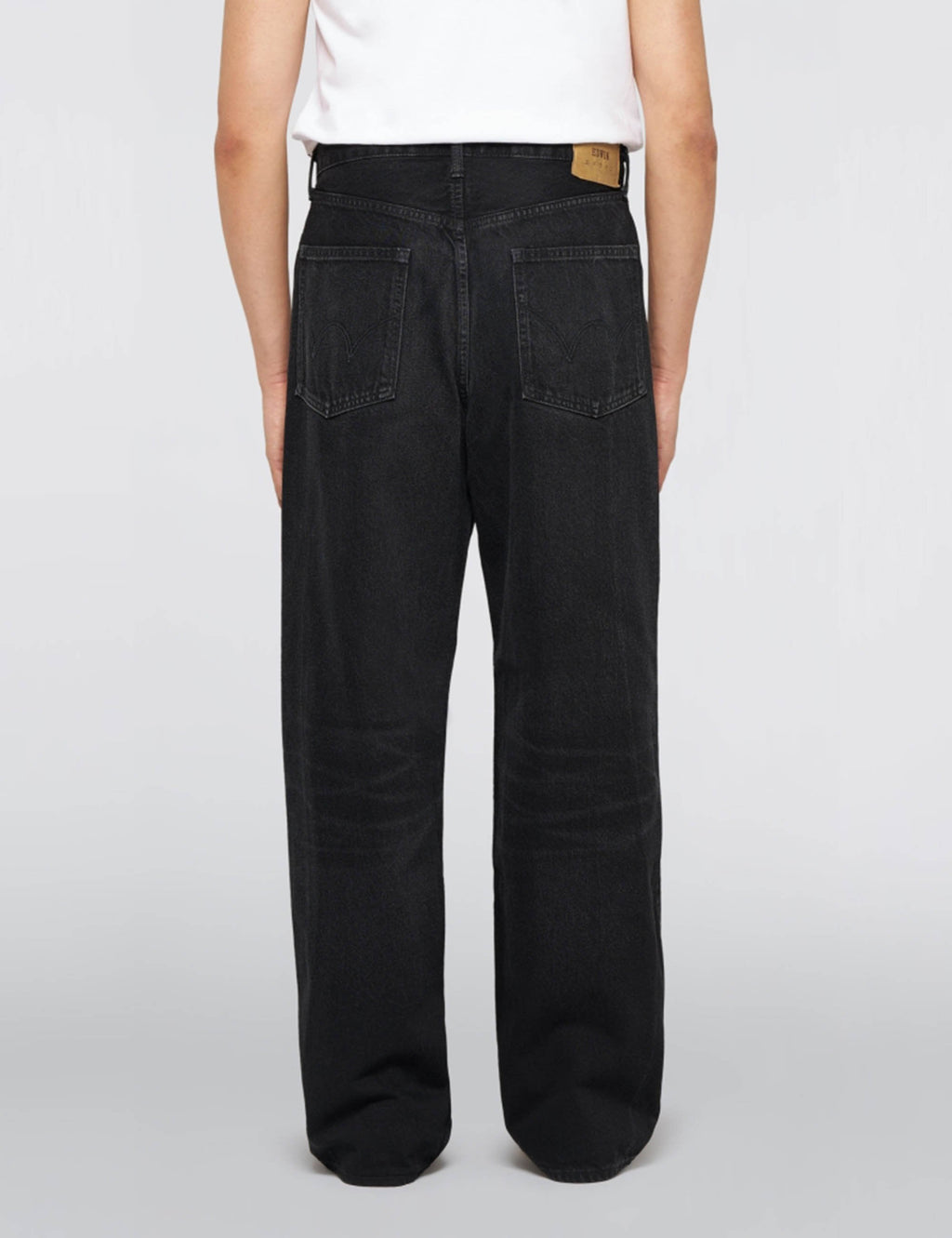 Wide leg dark wash denim pants with straight baggy fit and belt loops