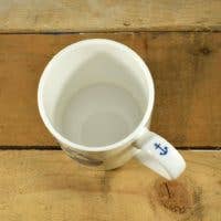 White bone china mug interior view with circular rim and base