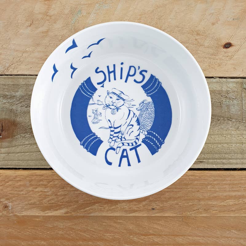 White cat bowl with blue Ship's Cat illustration and “SHIP'S CAT” text