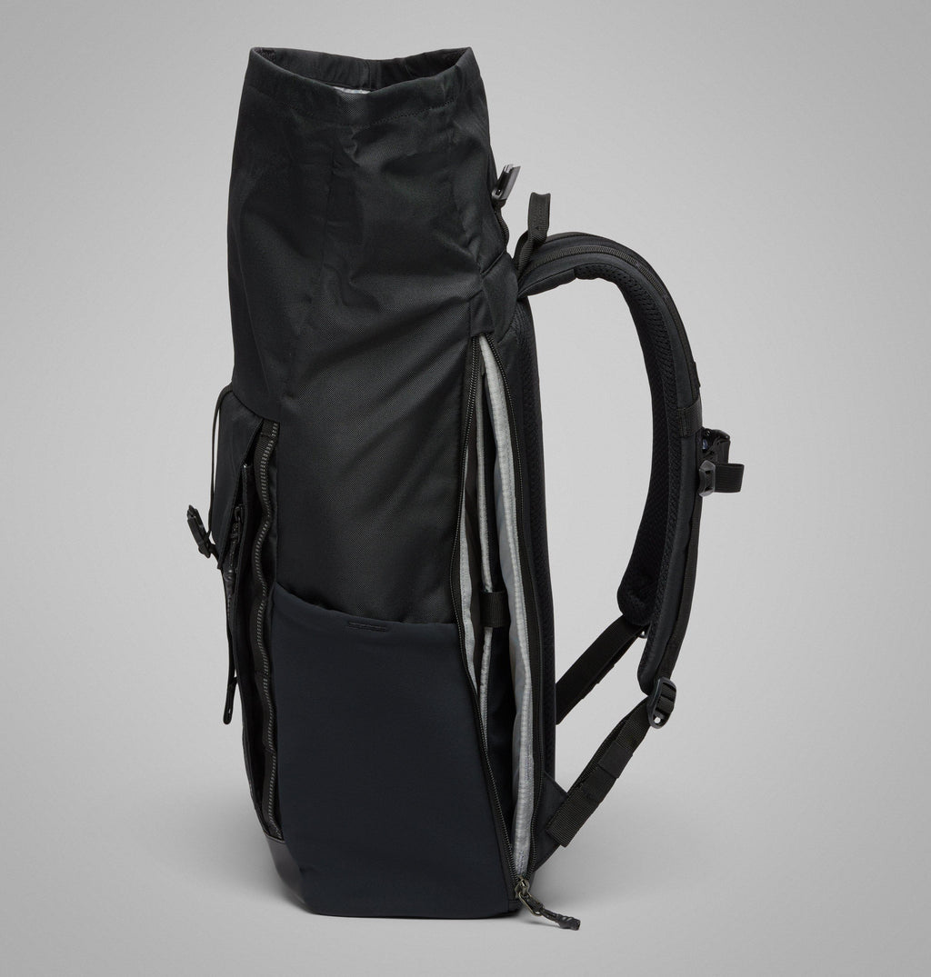 Black Columbia 27L backpack with side zippers and padded shoulder harness