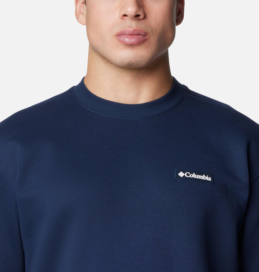 Columbia navy crewneck sweatshirt close-up with logo on chest and ribbed collar