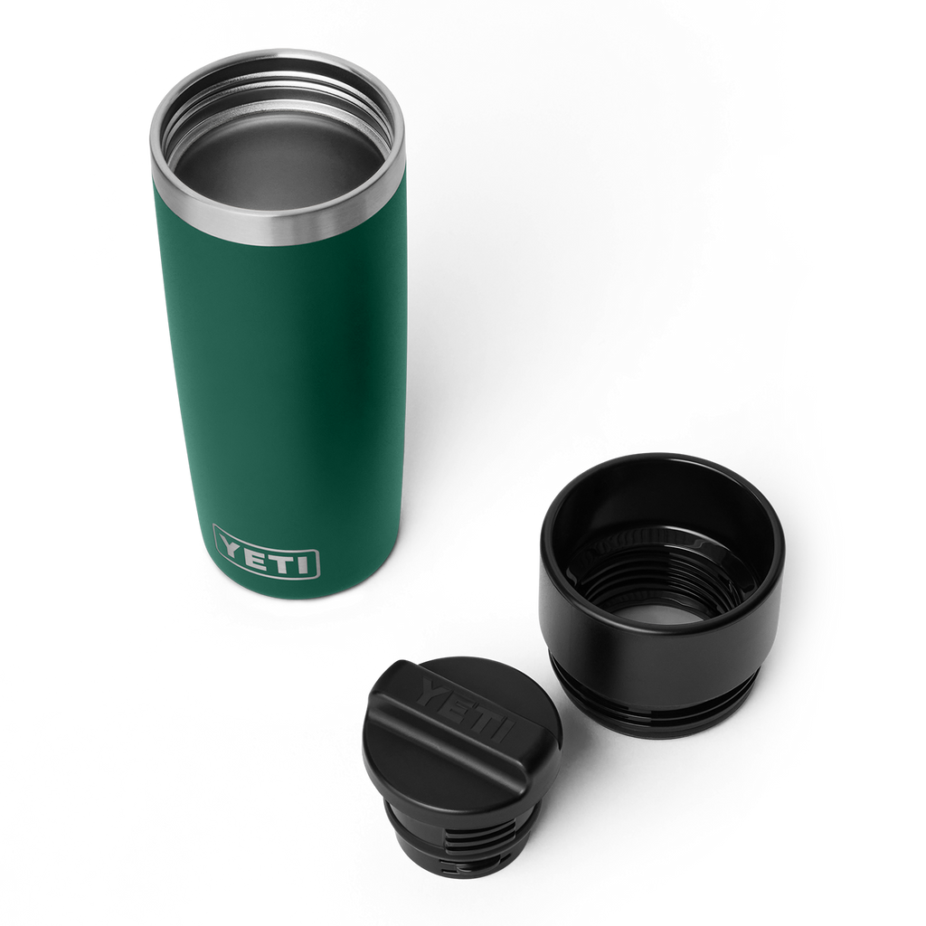 Rambler travel bottle open with commuter cap removed, dark green body and threads