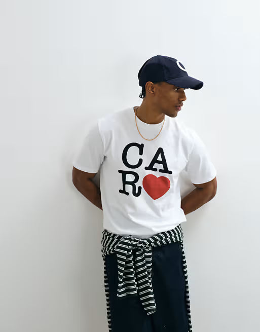 White T-shirt with bold CA R logo and red heart graphic print