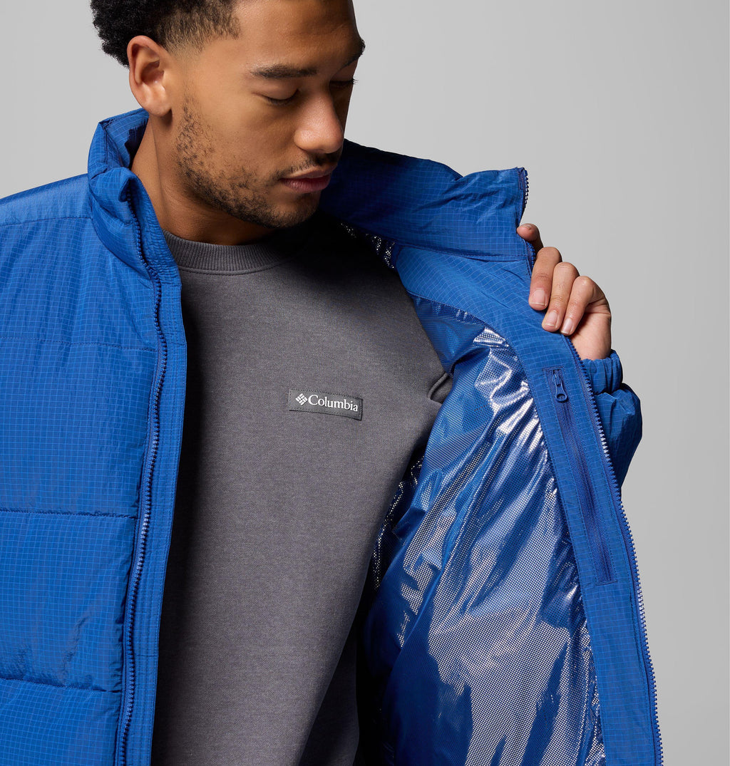 Men's blue puffer jacket open at zipper, revealing glossy blue lining and logo label.