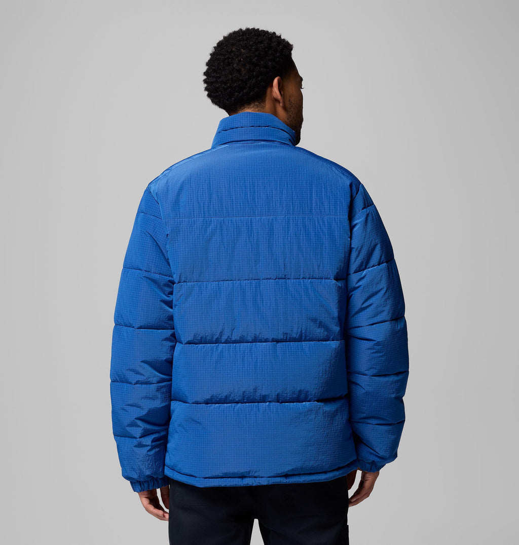 Men's blue puffer jacket, back view with high collar and padded horizontal panels.