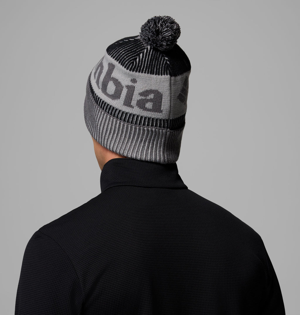 Grey knit beanie with pom-pom and jacquard lettering-style graphic on the back
