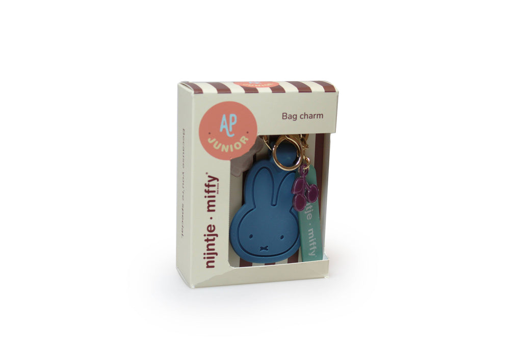 Aquamarine bunny bag charm in retail box with keyring visible