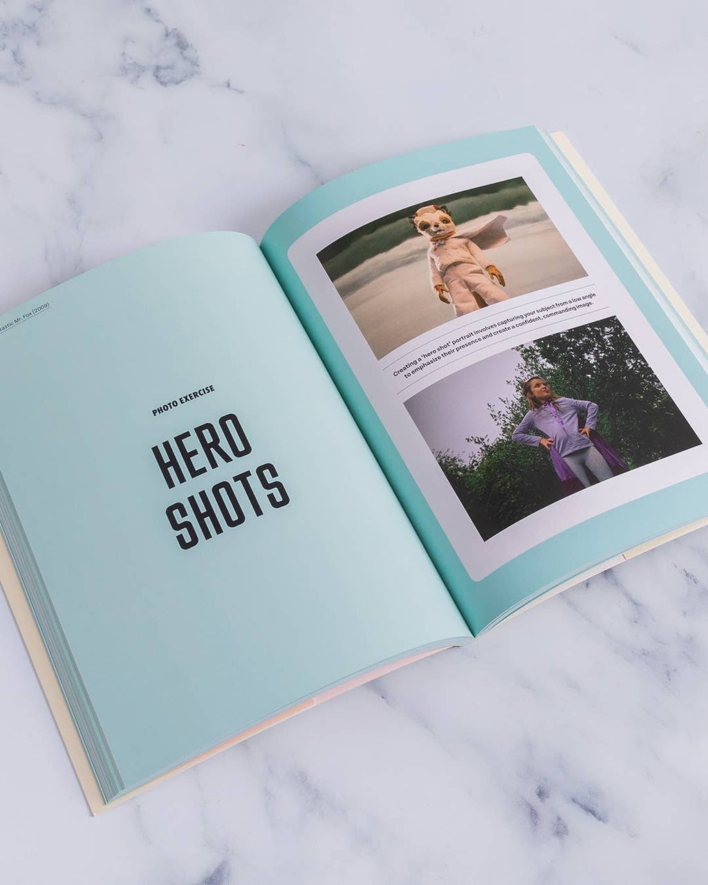 Open book spread with "Hero Shoots" heading and two photo examples