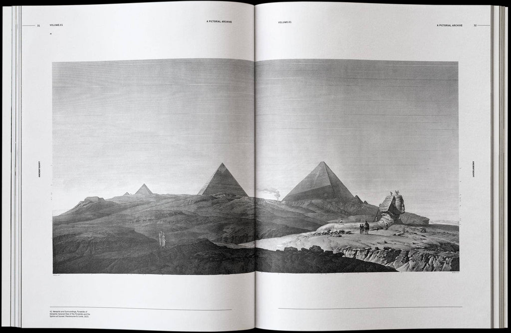 Open Ancient Egypt book pages with black-and-white pyramid landscape photo
