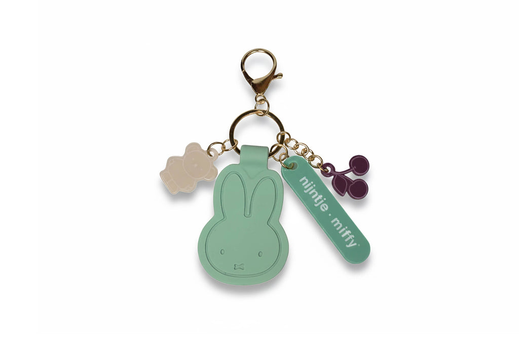 Miffy mint bag charm keychain with rabbit and mini charm tags on a metal ring