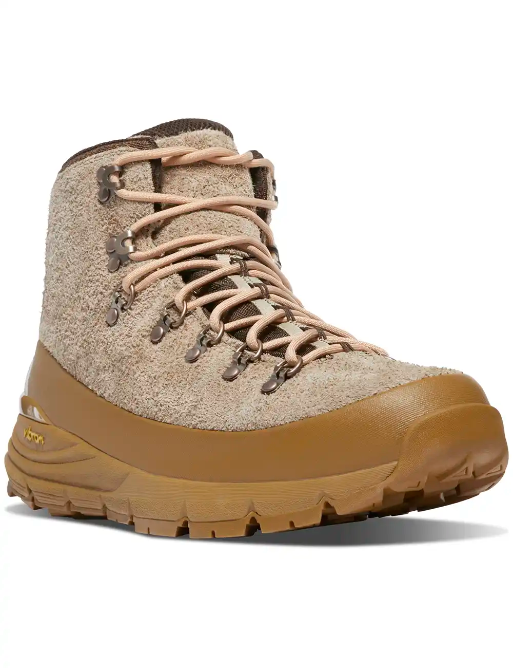 Almond suede lace-up boot with metal eyelets, tan outsole, and protective sidewall