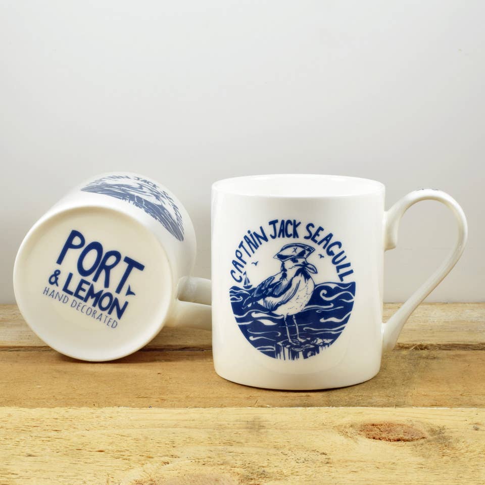 White bone china mug with blue Port & Lemon and decorated base